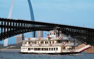 arch with boat and eads bridge