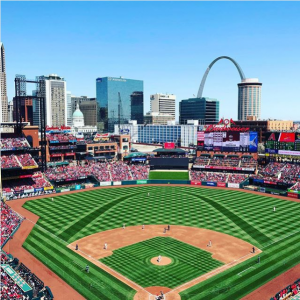 Busch Stadium with the Arch in the background.